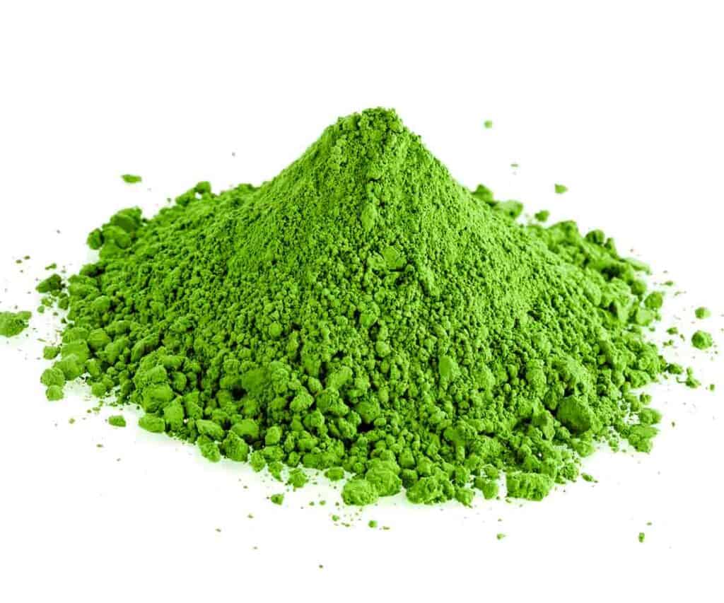 matcha green tea powder on a white background