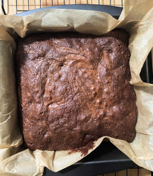 A pan of brownies on a cooling rack.