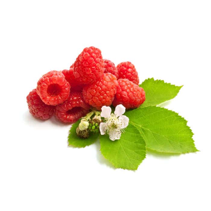 Raspberries with flowers and leaves on a white background.