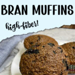 Three blueberry bran muffins on a white plate. The text reads Blueberry bran muffins high fiber!
