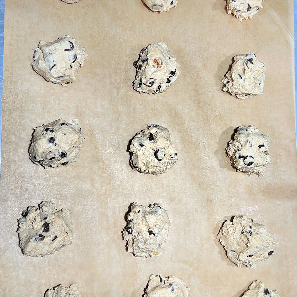 Cookie dough on a baking sheet.