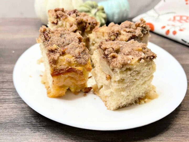 Peach tea cake on a white plate.