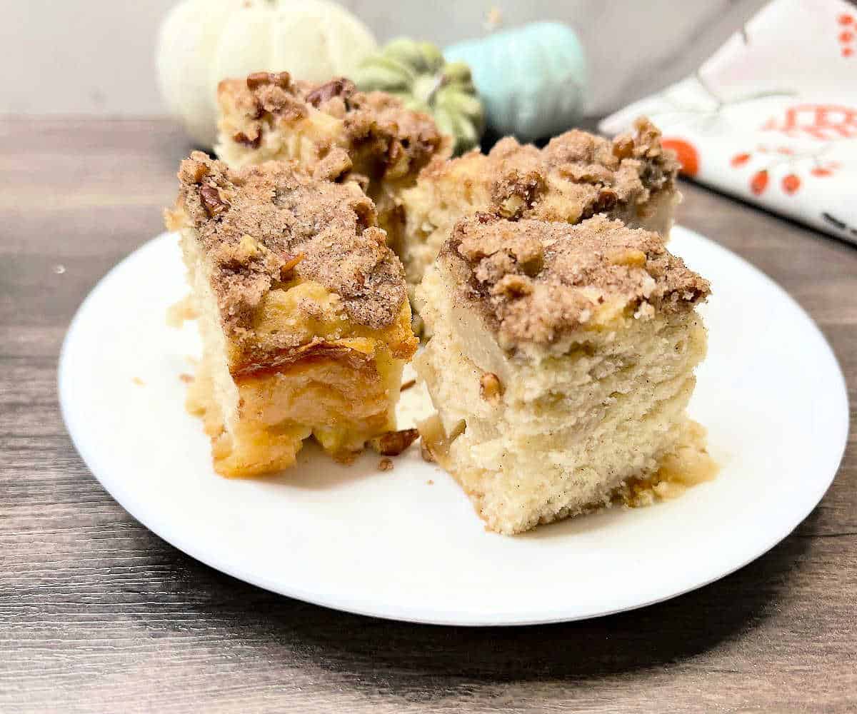 Peach tea cake on a white plate.