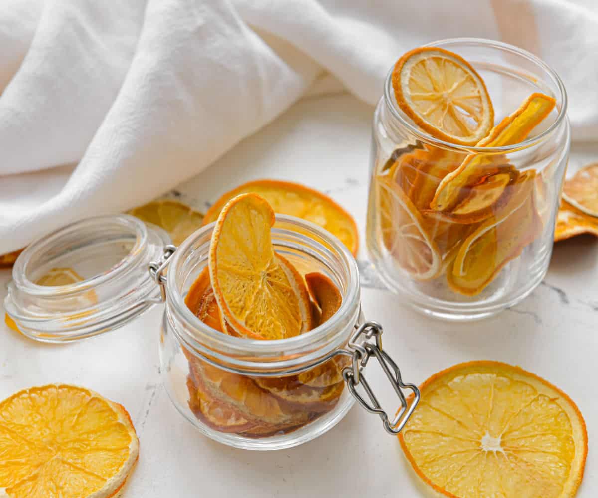 Dried orange slices in glass jars.