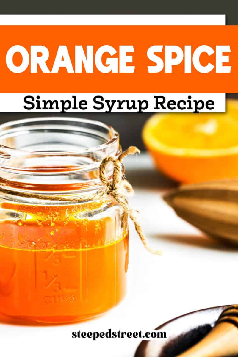 A small glass jar with orange spice simple syrup. The text reads orange spice simple syrup recipe.